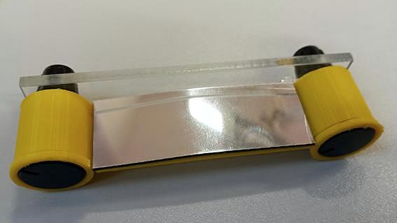 Opravený modul flexibilního zrcadla s nalepenou zrcadlovou tapetou